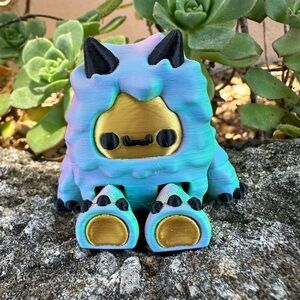 Colorful Yeti Monster Toy with Gold Face